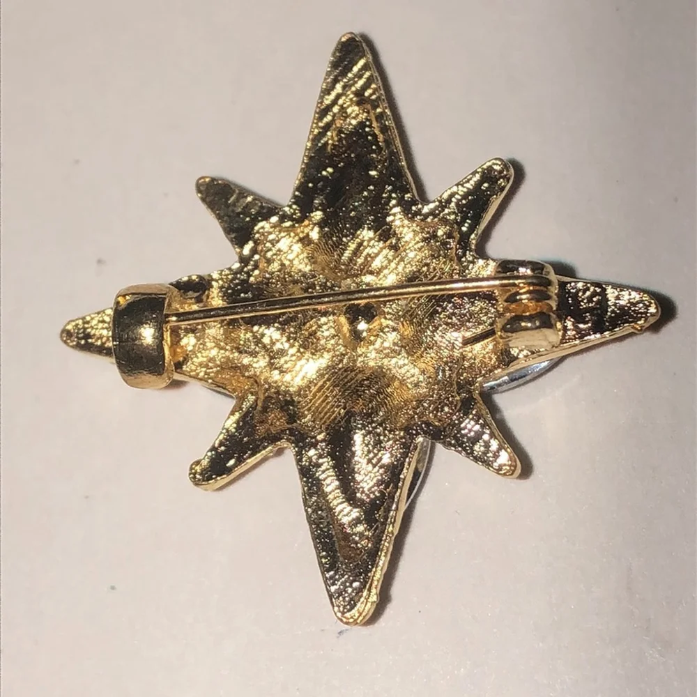 Elegant Gold Tone Purple Starburst Brooch